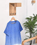 Heavy Duty Solid Wood Wall Mounted Coat Rack With Reinforced Metal Hooks showing blue shirt and plants, practical entryway organizer.