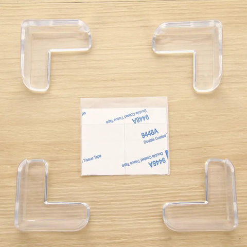 30 Pcs Table Corner Protectors With Heavy Duty Adhesive Tape Soft PVC Safety Corner Guards displayed on a wooden table surface.