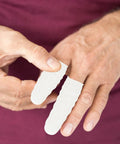 Tough As Nails White Nitrile Finger Sleeves 100 Pack Antistatic Insulated Guard Covers For Electronics Repair and Skin Healing snug fit on fingers.