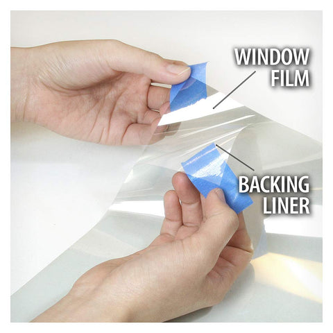 Hands peeling blue tape from 8 mil clear window film with backing liner, titled Window Film Security And Safety 8 Mil Clear 24 Inch By 49 Foot.