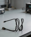 12 Speed Electronic Shifting Cable for Bicycle with USB C Charging Cord, PVC Derailleur Wire for Di2 Systems on table