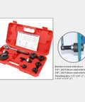Open red case showing Ratchet Knockout Hole Punch Driver Kit For Pros with manual and accessories for metal sheets and drilling projects.