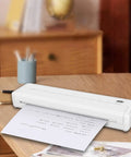 Slick Wireless Tattoo Transfer Stencil Printer For A4 Paper Mini Thermal Stencil With Hassle Free Inkless Tech Bluetooth And Usb C Wired Sync For Straight Up Clean Crisp 203 Dpi Prints on a wooden desk.