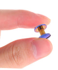 Rock Solid Chicago Screws And Heavy Duty Binding Bolts For Scrapbooks Photo Albums Crafting Gear held between fingers.