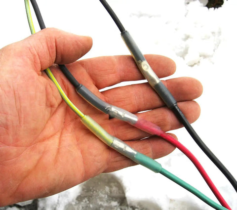 Get This Heavy Duty Underground Wire Splice Kit For Submersible Pumps Featuring Clear Dual Wall Heat Shrink And Black Outer Sleeve To Seal 16-14 Awg Four Conductor Cords Waterproof And Repair Electrical Connections With Ease. four-conductor cable splice with heat shrink on 16-14 AWG wires