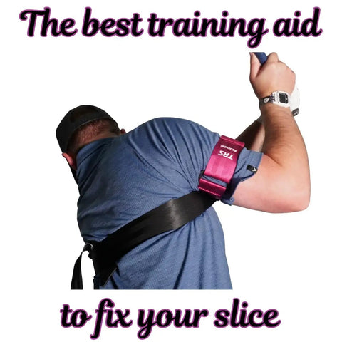 Golfer using TRS Slider Golf Swing Trainer to boost your distance and accuracy, showing arm connection strap in use.