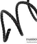 Black twisted cable protection spiral close-up with 'FASHION' branding. Image does not match Electric Scooter Side Cover Replacement Parts focus.