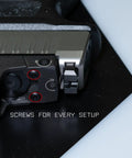 Close-up of Go To Red Dot Pistol Mount Screw Kit With Sixteen Common Screws Including M3 And M4 installed on a pistol.