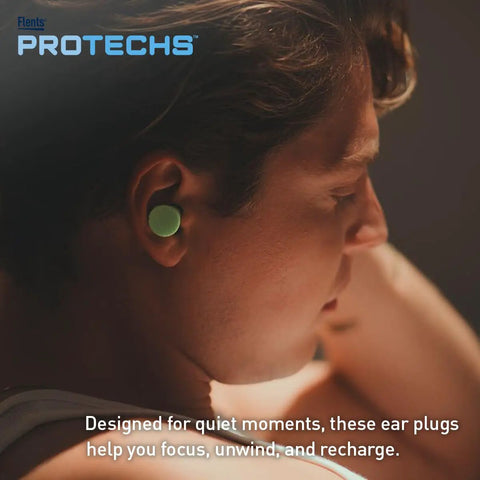 Person wearing green ear plug from Multi Purpose Foam Ear Plugs With Case For Sleep Travel Work Concerts Shooting Snoring Studying And Loud Noise Reduction NRR 33 Green Made In USA 10 Pairs