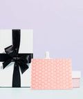 Pink Heart Shaped Bubble Mailers Pack For Jewelry And Delicate Items With Shockproof Plastic Bags next to gift box and container