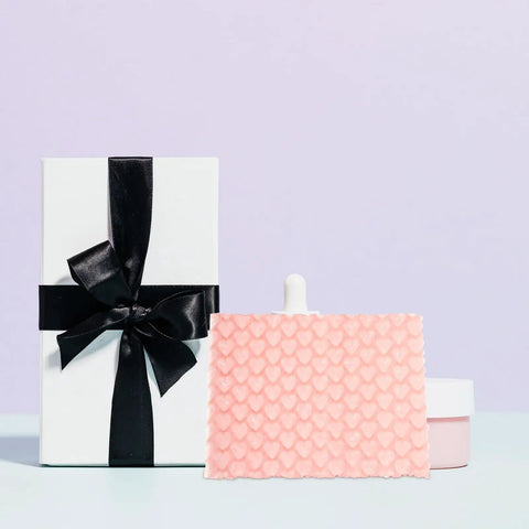 Pink Heart Shaped Bubble Mailers Pack For Jewelry And Delicate Items With Shockproof Plastic Bags next to gift box and container