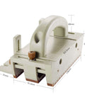 Angled front view of Zebekk push block for table saws, routers, band saws and jointers; grey plastic with brown grips.