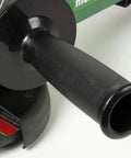 Close-up of handle and guard on 4.5 Inch Angle Grinder With 10.5 Amp Motor And 11,500 RPM, Paddle Switch, Non Locking For Safe, Ergonomic 6.6 Inch Grip