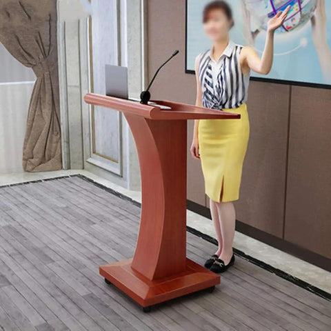 Rock Solid Wood Roll Away Lectern With Plenty Of Storage Space, 115cm high, used during a presentation in a classroom setting.