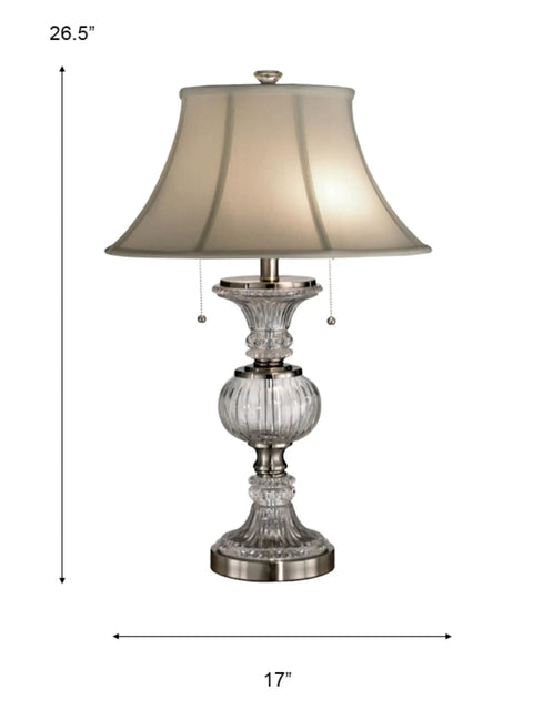 Front view of Granada Table Lamp With Crystal Base And Brushed Nickel Finish, featuring a white fabric shade and faceted crystal pedestal.