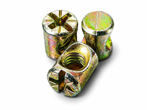 Close-up of cross dowel nuts from Beefed Up Barrel Nut And Bolt Fastener Set For Furniture, Heavy Duty Cross Dowel Connectors Kit