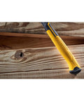 Beast 14 Oz MIG Weld Hammer With Checkered Face ToughSeries Steel Nailing Hammer for Metal Fabrication resting on wood
