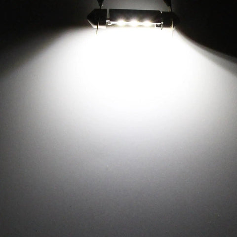 LED Festoon Bulbs 31mm 7065 6000K Xenon White CAN Bus Interior Dome Map Trunk Step Courtesy Lights lit up, showing bright illumination.