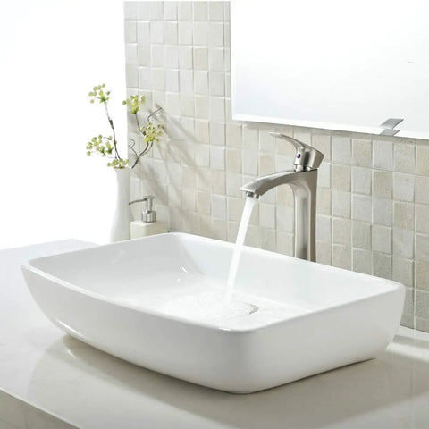 All In One White Ceramic Vessel Sink And Brushed Nickel Faucet Combo For Bathroom Vanity, 24 Inch Round Above Counter Porcelain Lavatory With Pop Up Drain, Durable Kaolin Ceramic Construction And Smooth Glaze Finish in a modern bathroom setting