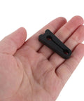 40Pcs Universal Fit Car Door Shock Absorber Pads Rubber Buffer Damper Deadener For Noise Reduction And Super Quiet Latch Guard Cushion To Kill Those Bangs in a hand, showcasing the black rubber pad.