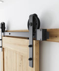 Built Like A Tank 7 Foot Sliding Barn Door Hardware Kit featuring heavy duty steel tracks and pulleys for smooth sliding.