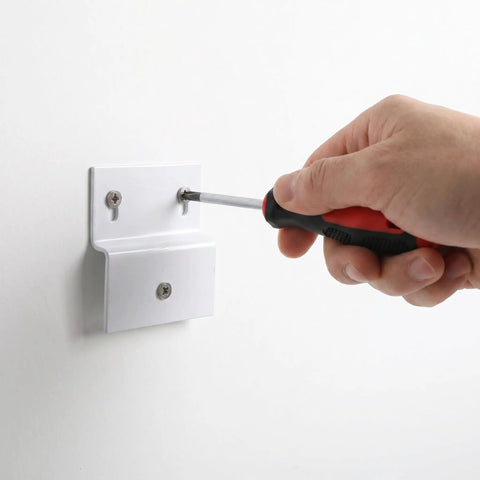 Installing heavy duty Z shaped shelf brackets for cabinets and tile walls with screwdriver