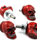 Red skull-shaped fasteners from Skull License Plate Screws 4 Pack Universal Fit For Cars Trucks And Motorcycles Red Premium Dope Car Accessories Bolts