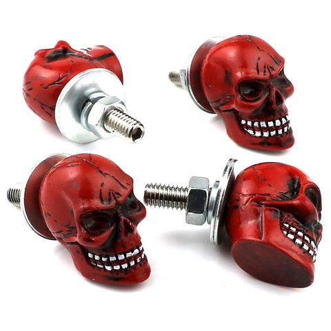 Red skull-shaped fasteners from Skull License Plate Screws 4 Pack Universal Fit For Cars Trucks And Motorcycles Red Premium Dope Car Accessories Bolts