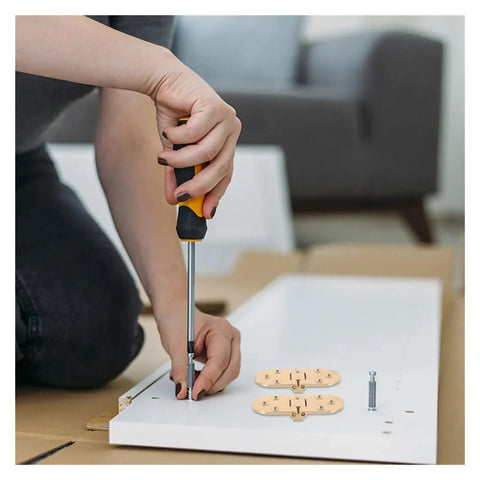Installing Rock Solid Adjustable Hinges For Doors And Folding Tables with a screwdriver on a white panel.