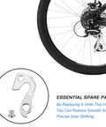 Derailleur Hanger Replacement For Mountain Bikes And Road Bicycles Aluminum Alloy Silver Finish in focus with rear bike wheel