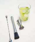 Ultimate Bar Tools Set for Home Bartenders includes 8 inch muddler, 10 inch mixing spoon, measuring jigger with cocktail