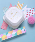 4 In 1 Paper Corner Trimmer With Oval Fish Eye Dovetail And Diagonal Angle Puncher on colorful paper with pink pompom