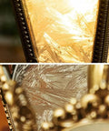Close-up of Cool Copper Pendant Light With Ice Crack Glass Lantern Adjustable Hanging Height Single Head Chandelier glowing softly