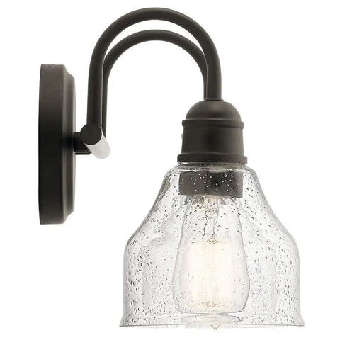 Side view of Avery 14.75 Inch Two-Light Vanity Light With Clear Seeded Glass In Olde Bronze installed with glass facing down.