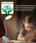 Child studying under Two Pack Clip-On Reading Lamp With USB Rechargeable Battery, Bed Clamp, 18 LED Eye-Friendly Light