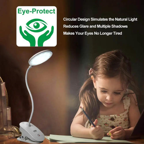 Child studying under Two Pack Clip-On Reading Lamp With USB Rechargeable Battery, Bed Clamp, 18 LED Eye-Friendly Light