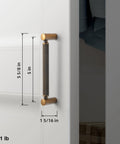 Side view of Six Pack 5 Inch Center To Center Antique Brass Cabinet Pulls with Knurled Grip and Circular End Caps on a cabinet door.