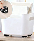 Glide Easy Appliance Mover Set With No Sweat Self Adhesive Mounts And Rock Solid 360 Swivel Casters For Kitchen Islands Coffee Bars And Couch Legs Eight Pack Black Finish shown on a white storage bin.