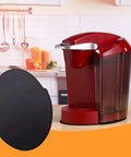 Slick Slide Mat For Keurig K Classic Coffee Maker Slider Pad Mover Extender Tray against a red Keurig in kitchen setting.