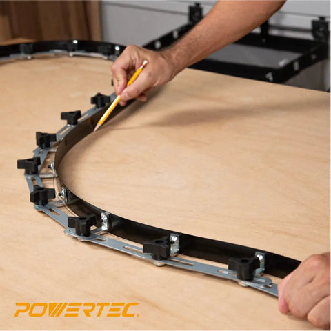 Using Heavy Duty Flexible Curve Template Kit With 107 And 37 Inch Steel Contour Guides for precise markings on wood surface.