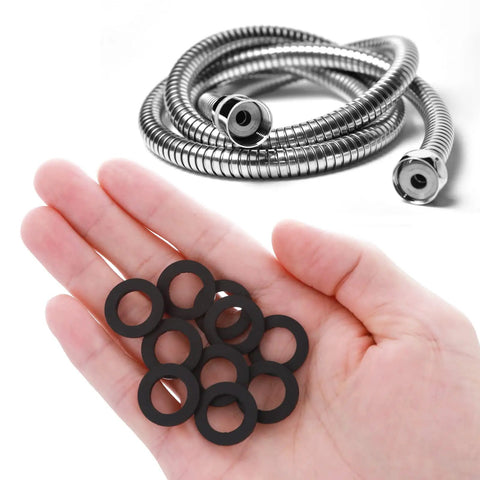 Hand holding Rubber Washers For Hose And Shower Head Half Inch Seal Kit 24 Pack 19Mm OD 11Mm ID 2Mm Thick Leak Proof Seals