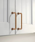 Eight Pack Two And A Half Inch Antique Brass Cabinet Handles And Drawer Pulls With Screws for kitchen cabinets installed