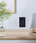 Black GFCI Outlet 15 Amp 2 Pack Weather Resistant With LED Indicator installed in a modern kitchen setting