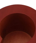 Close-up view of the interior of the Red Solid Wood Espresso Portafilter Holder and Tamping Station Precision Slot.