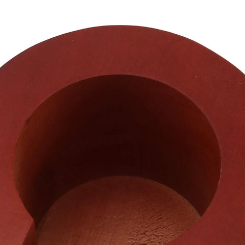 Close-up view of the interior of the Red Solid Wood Espresso Portafilter Holder and Tamping Station Precision Slot.