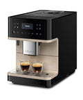 Top Shelf Fully Automatic Coffee And Espresso Maker Featuring Quiet Steel Grinder And Rich Milk Frother For Smooth Real Deal Brews and Quick Daily Home Satisfaction with two cups of espresso.