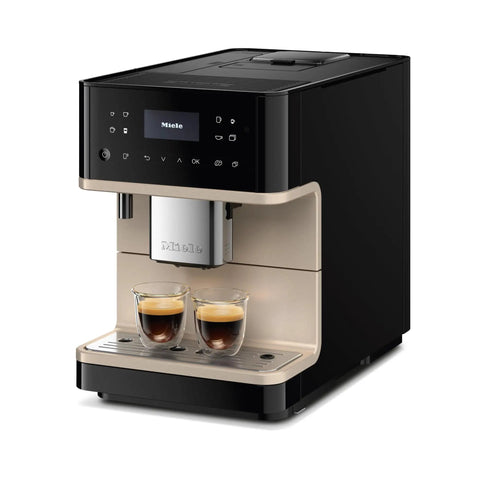 Top Shelf Fully Automatic Coffee And Espresso Maker Featuring Quiet Steel Grinder And Rich Milk Frother For Smooth Real Deal Brews and Quick Daily Home Satisfaction with two cups of espresso.