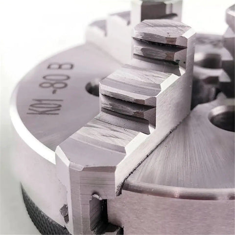 Close-up of 80mm 3 Jaw Self Centering Mini Lathe Chuck K01-80B showing hardened steel jaws for woodworking machines.