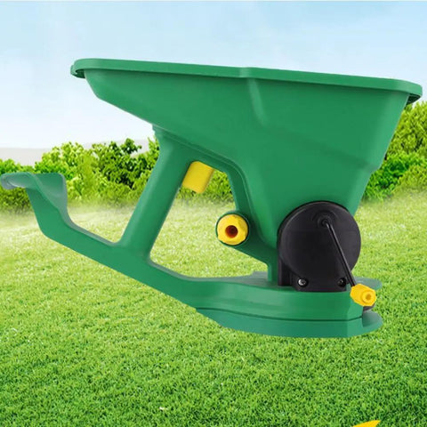 All Purpose Handheld Grass Seed Spreader For Lawn Care That Spreads Grass Seed Salt And Ice Melt Year Round in green on grass