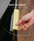 Hand holding a gold finger edge cabinet pull from the 15 Pack Gold Finger Edge Cabinet Pulls With 256mm Hole Center 10 Inch And 300mm Length 11.81 Inch Zinc Alloy Concealed Drawer Handles For Kitchen Cabinets And Drawers set.